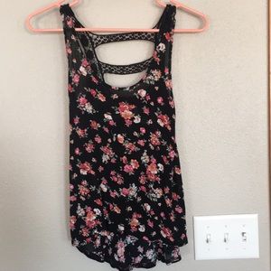 A lovely floral shirt with a Lacey back